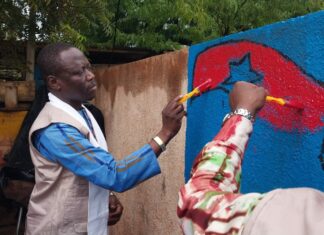 Caravane citoyenneté active: des coups de pinceaux sur les murs et voies de Kaya